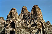 Angkor Thom - Bayon temple, second enclosure, towers of the South gopura 